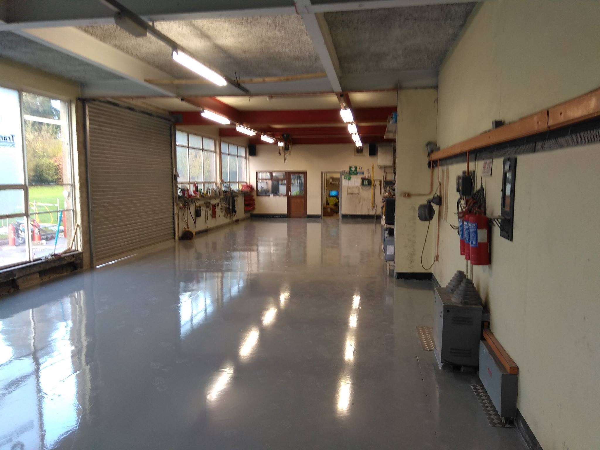 Workshop floor cleaned and painted.
